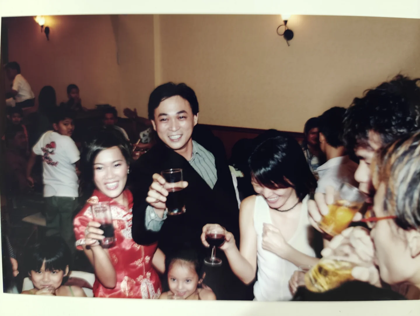 An older photograph of a couple celebrating at their wedding