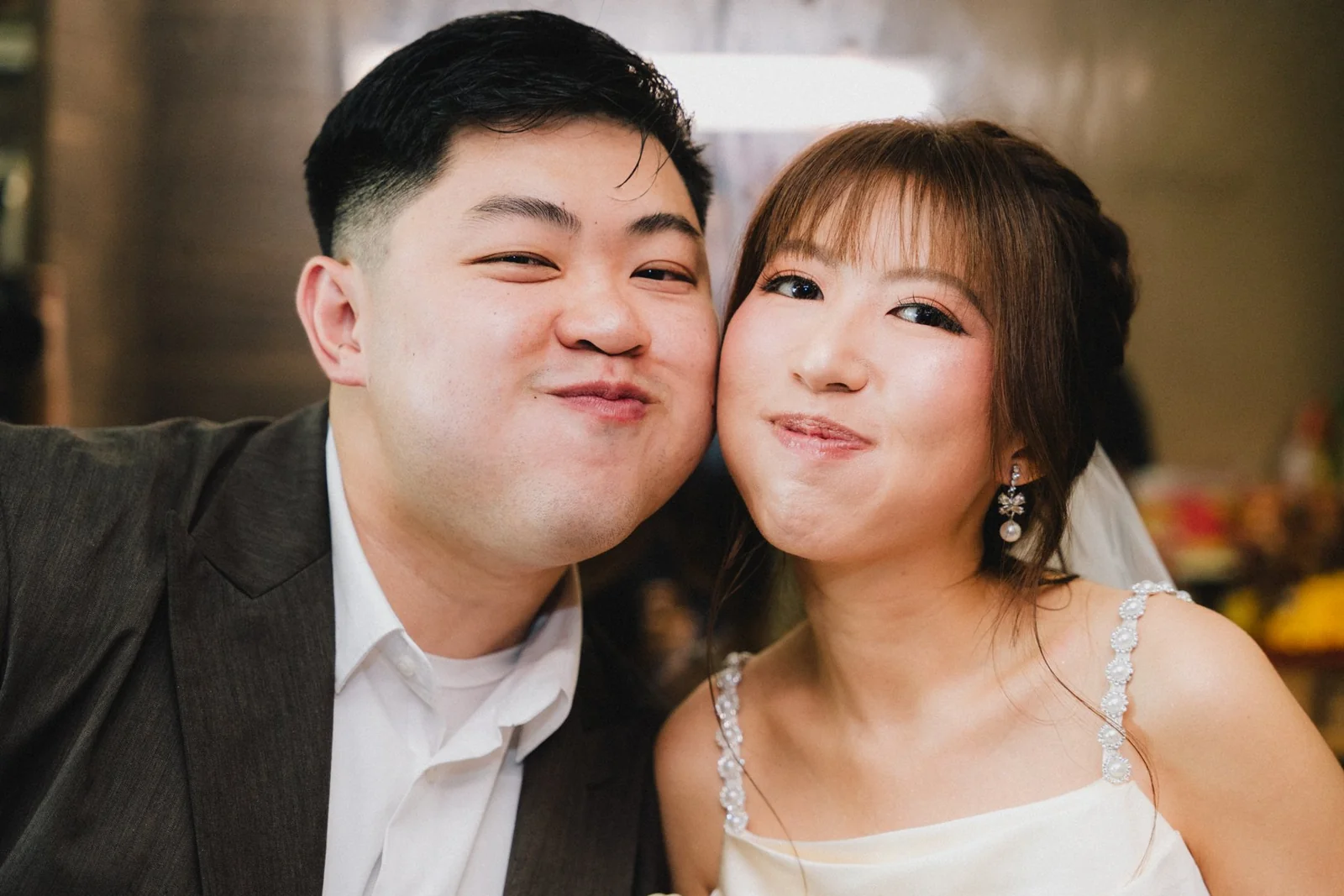 Jason and Belle making playful faces together