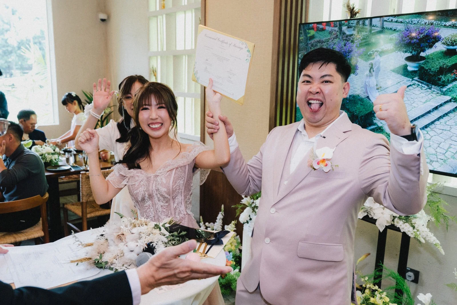 Jason and Belle celebrating with their guests