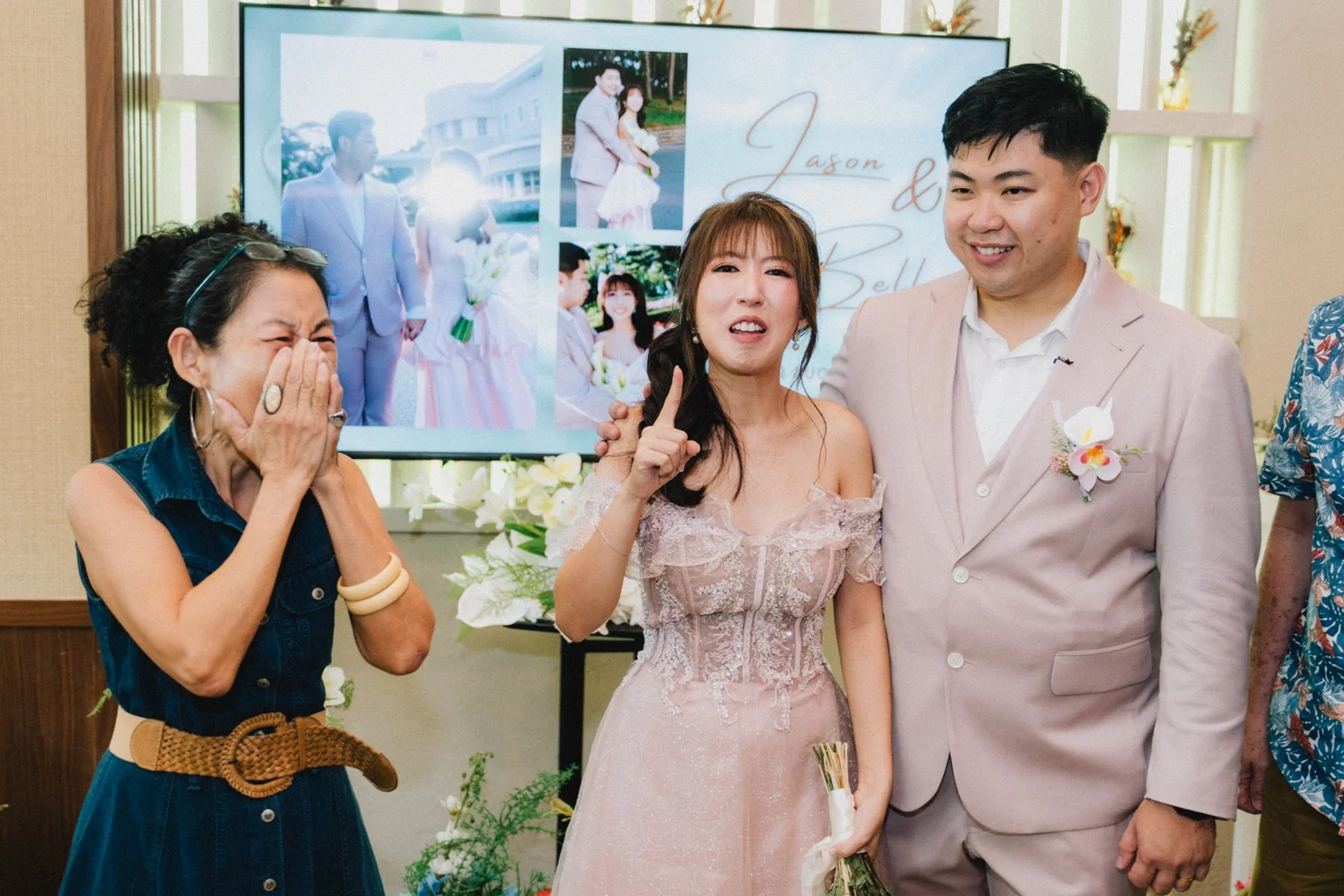 Jason and Belle gathered with loved ones while a guest speaks